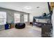 Bedroom with many windows, storage cubes, toys, and a black beanbag chair at 670 Belle Grove Dr, Clover, SC 29710