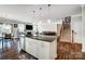 Open kitchen featuring an island, stainless steel appliances, and seamless flow into living areas at 670 Belle Grove Dr, Clover, SC 29710