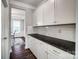 Kitchen with a long countertop, cabinets, granite, and stainless steel handles and hardware at 670 Belle Grove Dr, Clover, SC 29710