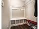 Mudroom with a built-in storage bench, cubbies, coat hooks, and a coat rack at 670 Belle Grove Dr, Clover, SC 29710
