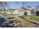 Suburban street showcasing well-maintained homes with driveways and landscaping at 8545 Filbert Ln, Charlotte, NC 28215