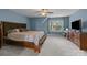 Comfortable bedroom with a spacious bed, natural light, and ample closet space at 9004 Cebu Ct, Fort Mill, SC 29708