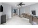 Versatile bonus room with a comfortable sofa, natural light, and ample workspace at 9004 Cebu Ct, Fort Mill, SC 29708