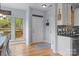 Inviting entryway boasts hardwood floors, natural light, and access to outdoor deck at 9004 Cebu Ct, Fort Mill, SC 29708