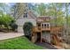 Charming home with a multi-level deck, attached garage, and lush greenery at 9004 Cebu Ct, Fort Mill, SC 29708
