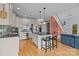 Bright kitchen with island, stainless appliances, and adjacent open living space at 9004 Cebu Ct, Fort Mill, SC 29708