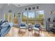 Bright and spacious living area featuring multiple windows and comfortable seating at 9004 Cebu Ct, Fort Mill, SC 29708