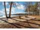 Secluded beach with trees and lake views at 101 N Cove Key Ln, Mooresville, NC 28117
