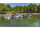 A view of the community boat docks, featuring several boats docked on the lake at 101 N Cove Key Ln, Mooresville, NC 28117