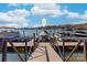 View of a boat dock on a clear, sunny day at 101 N Cove Key Ln, Mooresville, NC 28117