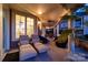 Covered patio with lounge chairs and comfortable seating at 101 N Cove Key Ln, Mooresville, NC 28117