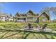 Expansive backyard featuring a custom fire pit and ample seating, ideal for outdoor gatherings and relaxation at 10209 New Town Rd, Marvin, NC 28173