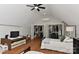 A spacious bedroom features a high ceiling, hardwood floors, and well organized closets at 10209 New Town Rd, Marvin, NC 28173
