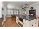 Open kitchen area with granite countertops, kitchen island with microwave and stainless steel appliances at 10209 New Town Rd, Marvin, NC 28173