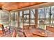 The delightful screened porch offers a view of a lake at 10209 New Town Rd, Marvin, NC 28173