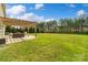 Outdoor patio area with pergola, ideal for entertaining and relaxation at 1022 Torrens Dr, Monroe, NC 28110