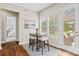 Cozy breakfast nook with a view of the outdoor patio and pergola at 1022 Torrens Dr, Monroe, NC 28110
