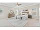 Elegant bedroom with tray ceiling, neutral tones, and bright natural light at 1022 Torrens Dr, Monroe, NC 28110