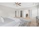 Large main bedroom featuring multiple doors leading to a closet and bathroom at 1022 Torrens Dr, Monroe, NC 28110