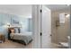 Modern bathroom featuring a tiled shower, neutral color scheme, and stylish fixtures, offering a serene bathing experience at 10415 Waxhaw Manor Dr, Waxhaw, NC 28173