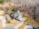 Beautiful aerial view of the home's location and neighborhood, including a long driveway at 1061 Verbena Ct, Tega Cay, SC 29708