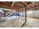 Unfinished basement with exposed beams, offering a blank canvas for customization and ample storage space at 1081 Evergreen Cir, Rock Hill, SC 29732