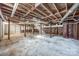 Unfinished basement with exposed beams, offering a blank canvas for customization and ample storage space at 1081 Evergreen Cir, Rock Hill, SC 29732