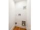 This simple laundry hookup area features new hardwood floors, fresh paint, and new electrical and plumbing at 1081 Evergreen Cir, Rock Hill, SC 29732
