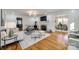Spacious living room with fireplace and hardwood floors with open access to dining room at 1081 Evergreen Cir, Rock Hill, SC 29732