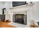 Bright living room fireplace with marble hearth, decorative screen, and modern mantel at 1081 Evergreen Cir, Rock Hill, SC 29732