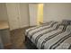Bedroom featuring neutral carpet and view into hallway at 109 Oakland Ave, Chester, SC 29706