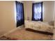 Cozy bedroom with neutral walls, carpet floors, and natural light coming through the window at 109 Oakland Ave, Chester, SC 29706