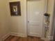 Hallway featuring hardwood style floors and neutral wall paint at 109 Oakland Ave, Chester, SC 29706
