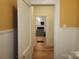 Hallway featuring view into living room with hardwood style flooring at 109 Oakland Ave, Chester, SC 29706