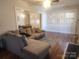 Spacious living room with hardwood floors, plantation shutters, and open dining area at 109 Oakland Ave, Chester, SC 29706