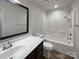 Bathroom featuring a shower-tub combo and a dark wood vanity with a sink at 1429 Alexander Rd, Rock Hill, SC 29732