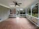Enclosed porch with tiled flooring and a ceiling fan at 1429 Alexander Rd, Rock Hill, SC 29732