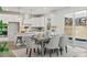 Well-lit dining area adjacent to the kitchen, perfect for Gathering meals and entertaining at 162 Holsworthy Dr, Mooresville, NC 28115