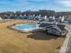 Community pool with lap lanes, area, covered pavilion, and surrounding homes at 162 Holsworthy Dr, Mooresville, NC 28115