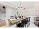 Cozy dining area with a rustic table, seating for six, and stylish decor at 173 Holsworthy Dr, Mooresville, NC 28115