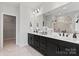 Elegant main bathroom features double vanity, spacious countertop, and modern shower at 173 Holsworthy Dr, Mooresville, NC 28115
