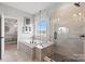 Luxurious main bathroom with separate shower, soaking tub, and stylish fixtures at 173 Holsworthy Dr, Mooresville, NC 28115