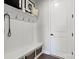 Mudroom features a built-in bench, storage baskets, and convenient hooks for organizing coats and bags at 173 Holsworthy Dr, Mooresville, NC 28115
