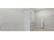 Walk-in closet features ample shelving and hanging space for organized storage of clothes and accessories at 173 Holsworthy Dr, Mooresville, NC 28115