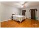 Bedroom featuring hardwood floors, ceiling fan, and bright natural light at 1847 Bertha Knight Rd, Lancaster, SC 29720