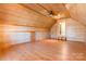 A large bedroom with wooden walls and ceiling offers a cozy and spacious retreat at 1847 Bertha Knight Rd, Lancaster, SC 29720