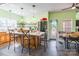 Eat-in kitchen featuring a center island with seating, a stainless steel refrigerator, and floating shelves at 1847 Bertha Knight Rd, Lancaster, SC 29720
