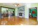 Spacious living room featuring a decorative fireplace and views of the kitchen and entryway at 1847 Bertha Knight Rd, Lancaster, SC 29720