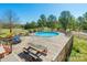 An above-ground pool is surrounded by a spacious deck, perfect for outdoor fun and relaxation at 1847 Bertha Knight Rd, Lancaster, SC 29720