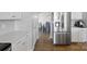 Modern kitchen with stainless steel refrigerator, quartz countertops and subway tile backsplash at 1875 Loggerhead Dr, Lancaster, SC 29720